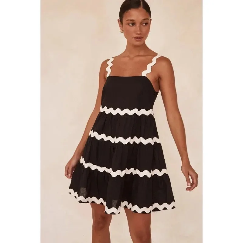 Sexy beach dresses for a sunny vacationCoya Statement Holiday Dress